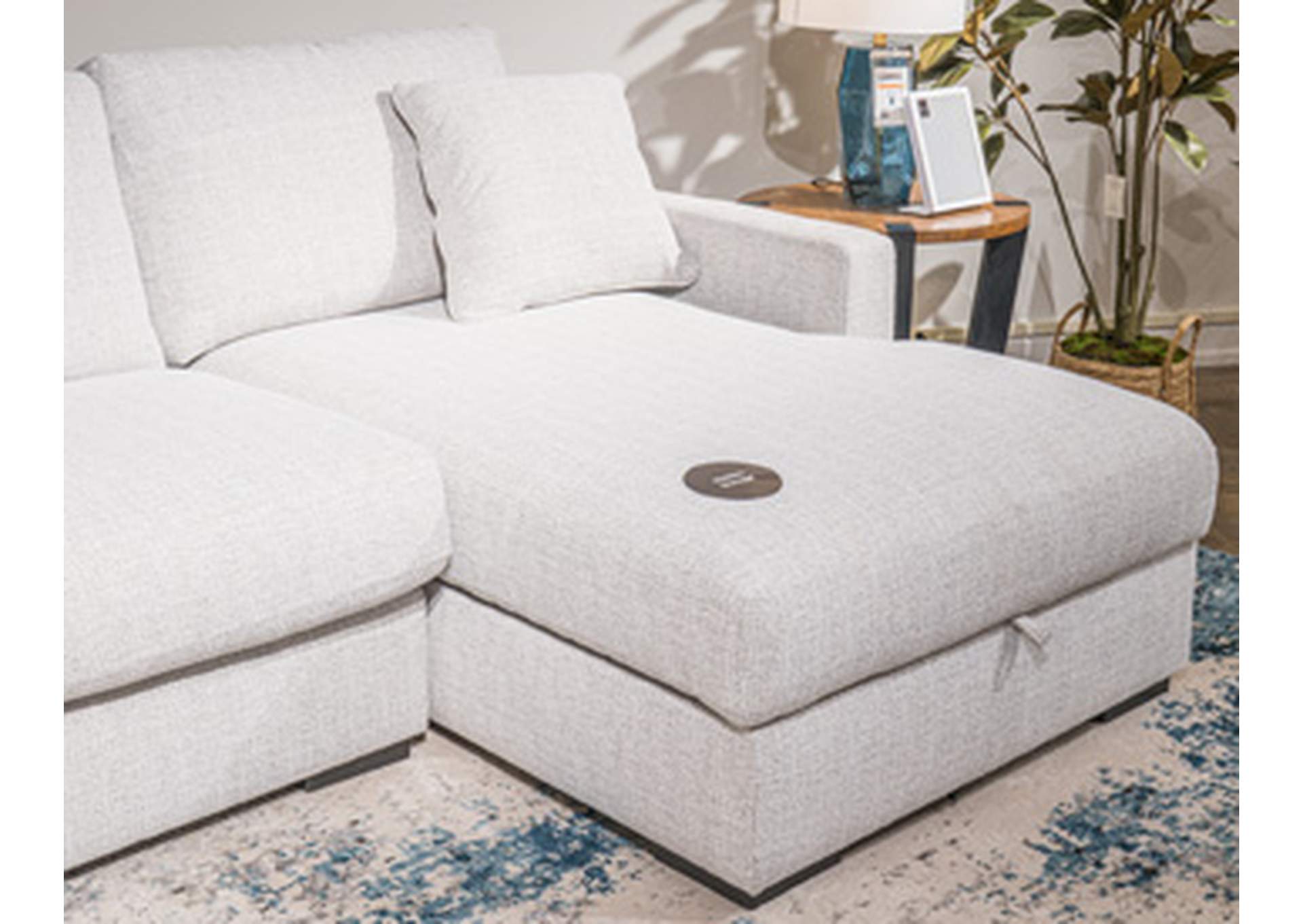 Omaha by Ashley 4-Piece Sectional with Storage Chaise and Audio Console image 1
