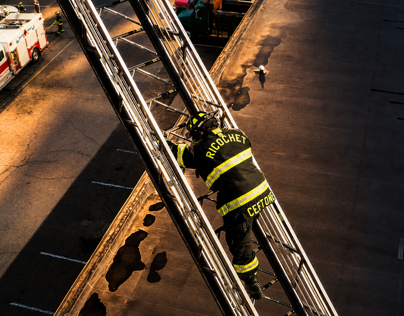 Firefighter demonstrating climbing mobility in Ricochet Maximum Mobility turnout gear