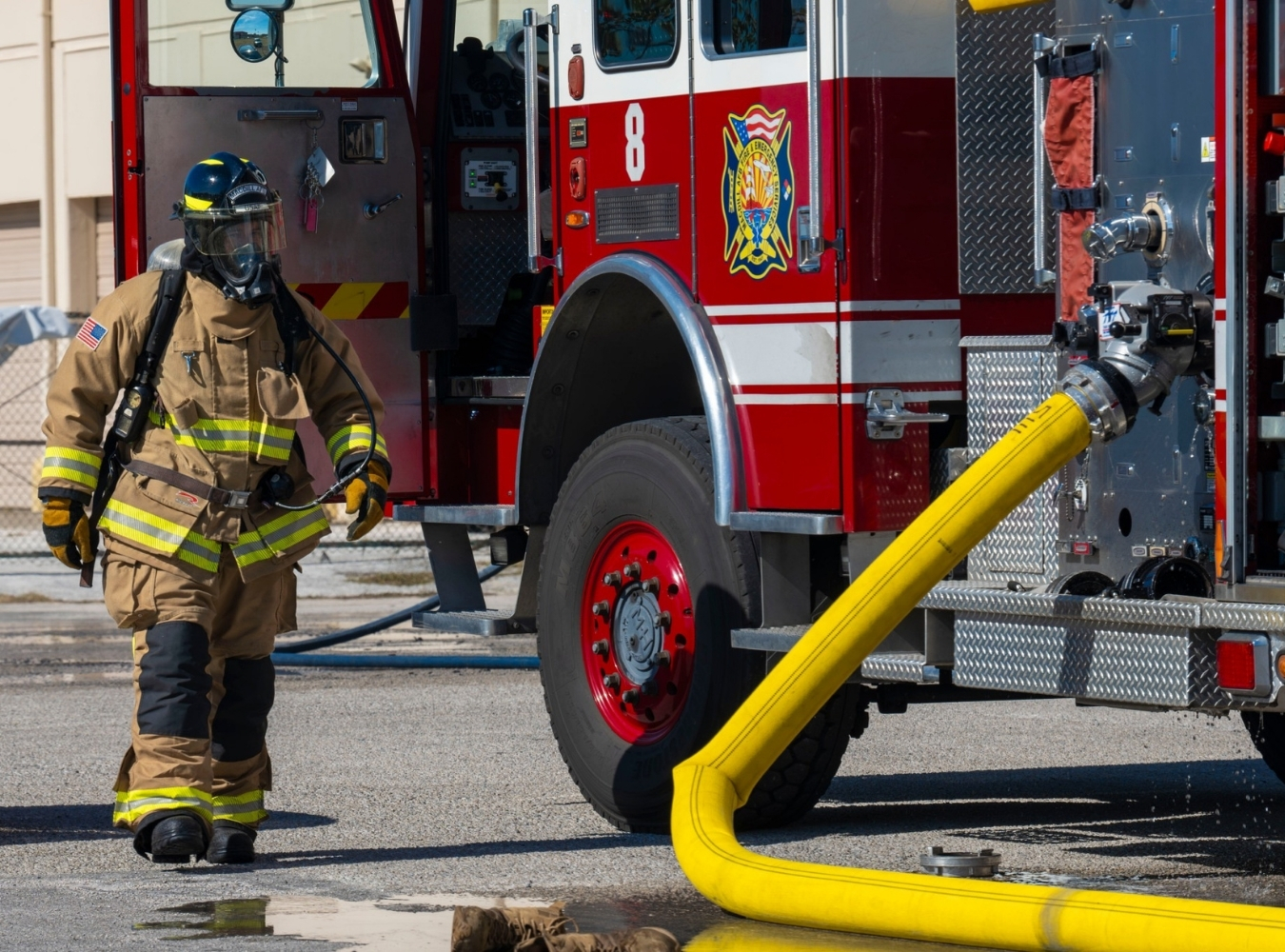 U.S. Air Force firefighters wearing Ricochet structural firefighting turnout gear