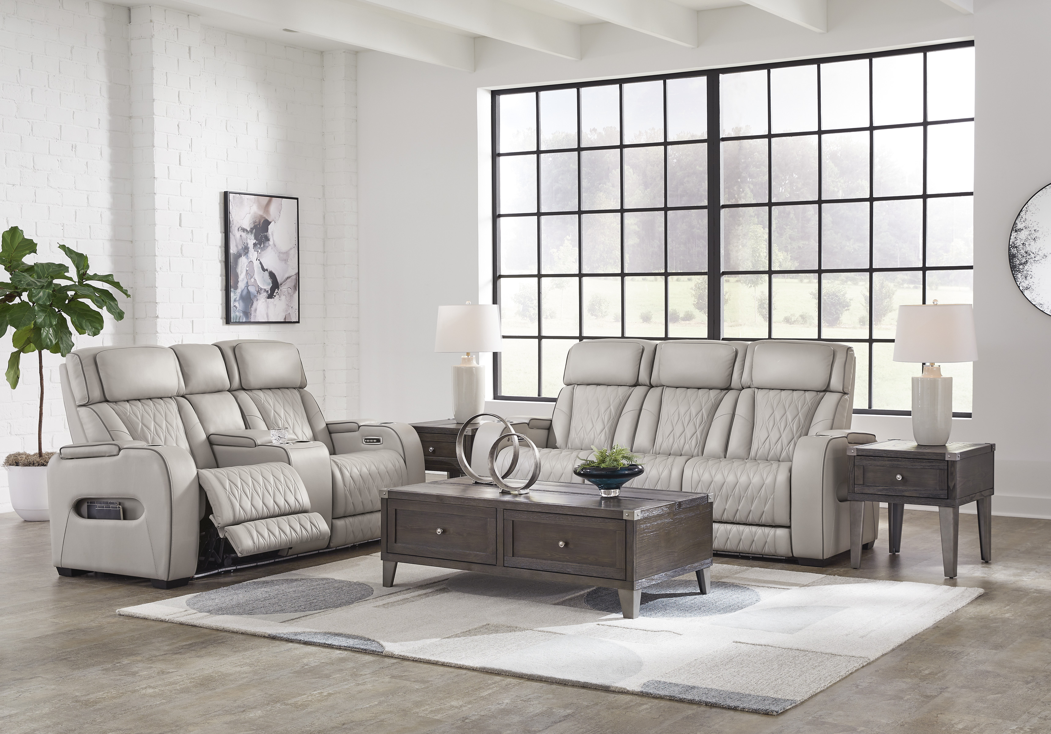 Boyington Power Leather Reclining Sofa & Loveseat + FREE 55 inch TV image 1